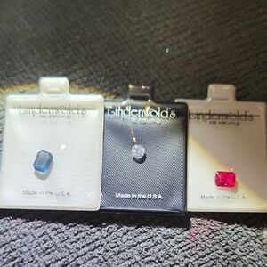 Lindenwolds Fine Jewelers Loose Gemstones - Blue, Clear, and Dark Pink